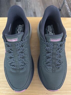 Olive colored Skechers slip-ins